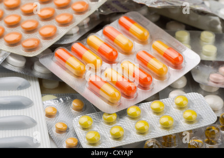 Close up of assorted pills in blister packs Stock Photo