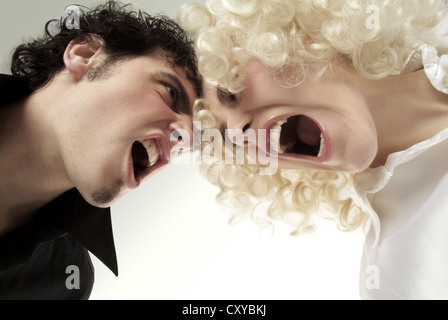 Young couple, face to face, screaming at each other Stock Photo