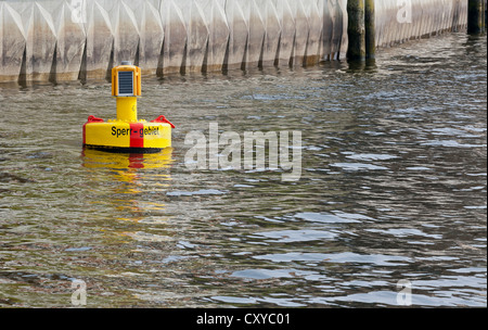 Yellow buoy in the harbour basin of Hamburg, Hamburg Stock Photo