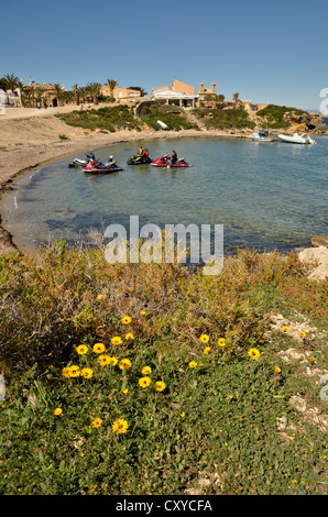 People on jet ski in the harbour the Island of Tabarca, Isla de Tabarca, Alicante, Costa Blanca, Spain, Europe Stock Photo