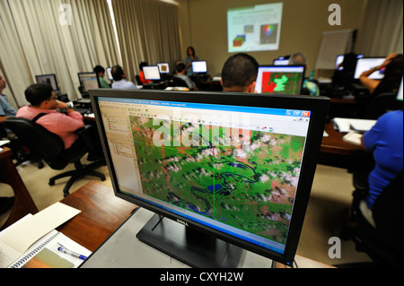 Forest managers are being trained how to read satellite images, monitoring system to monitor the deforestation of the Amazon Stock Photo