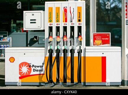 Fuel pumps at a Shell filling station Stock Photo