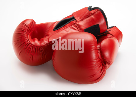 Pair of red boxing gloves isolated on white background Stock Photo