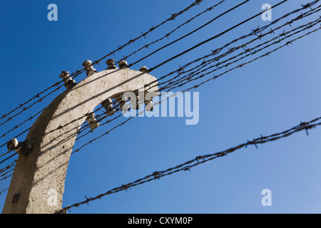 Barb wire electric fence inside the Auschwitz I former Nazi Concentration Camp, Auschwitz, Poland, Europe Stock Photo