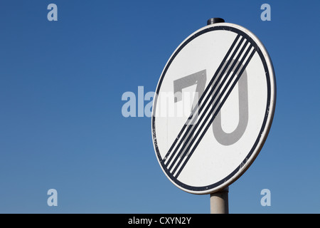 Traffic sign, end of the 70 km/h speed limit zone Stock Photo