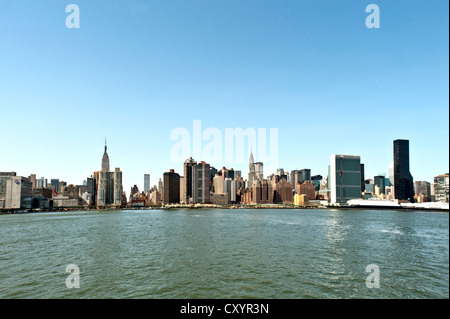 View of the east side of Manhattan from the ferry across the East River, Manhattan, United Nations Building, right, UN Stock Photo