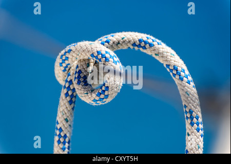 Running rigging on a sailing yacht with clove hitch Stock Photo