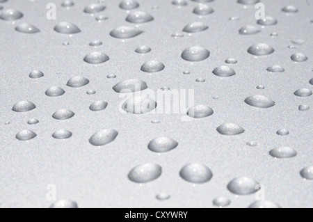 Water drops on a metal surface Stock Photo