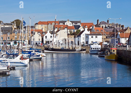 Anstruther Harbour in Fife Scotland with Fifie type fishing vessel Reaper moored near the Scottish Fisheries Museum Stock Photo