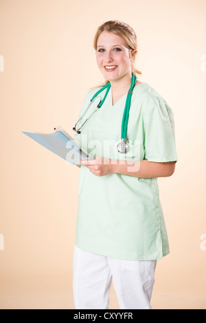 Nurse taking notes Stock Photo