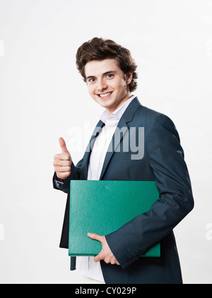 Smiling business people with thumbs up Stock Photo - Alamy