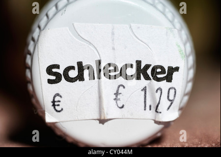 Schlecker logo and a price tag on a screw plug Stock Photo