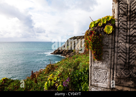 Minack Theatre, Cornwall outdoor outside seating area and stonework looking out to sea and rugged coastline Stock Photo