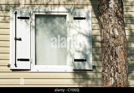 Window with wooden shutters Stock Photo