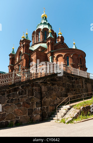 Uspenski Cathedral set upon a hillside on the Katajanokka peninsula overlooking the city of Helsinki, Finland Stock Photo