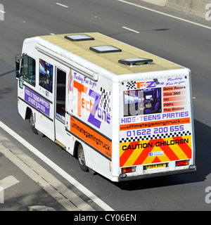 TechZone Gaming Truck for hire with night club style interior for kids to play computer games whilst parked on household drives Stock Photo