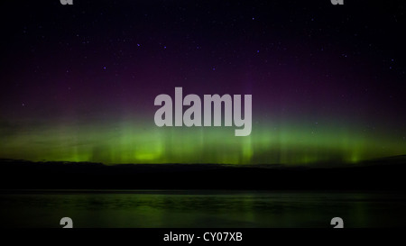 Aurora Borealis or Northern Lights seen from near  Tobermory on the Isle of Mull in the Inner Hebredes, Scotland, UK, Great Britain Stock Photo