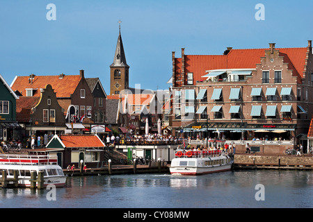 Netherlands, Edam-Volendam, View of the harbor, and the Reformed Church Spire in the background. Stock Photo