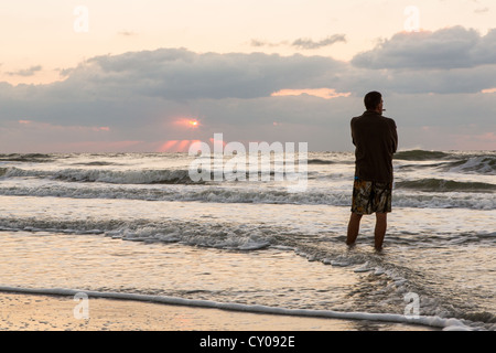 Watching sunrise on Hilton Head Island, SC Stock Photo