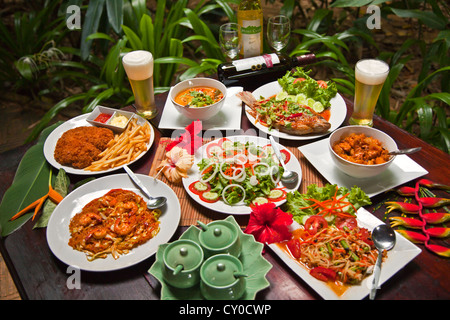 Delicious THAI CUISINE is served at OUR JUNGLE HOUSE near KHAO SOK NATIONAL PARK - SURATHANI PROVENCE, THAILAND Stock Photo