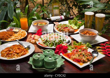 Delicious THAI CUISINE is served at OUR JUNGLE HOUSE near KHAO SOK NATIONAL PARK - SURATHANI PROVENCE, THAILAND Stock Photo