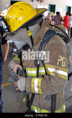 Firefighter in full  turnout gear Stock Photo