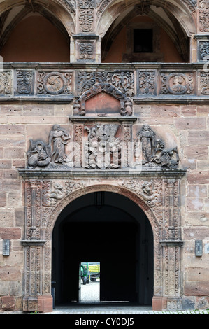 Two stone carvings above the entrance on the wall of the old fortress ...