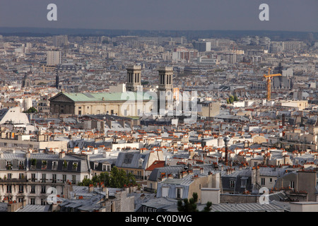 view from Sacre Coeur of Montmartre with the church St-Vincent-de-Paul de Paris Stock Photo