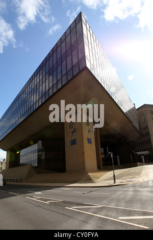 Sunshine reflects on the former Trinity Road office of the Lloyds Banking Group and Halifax bank in Halifax, West Yorkshire. Stock Photo