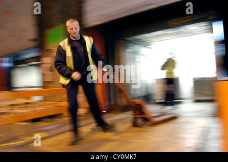 Man Working in Warehouse Stock Photo