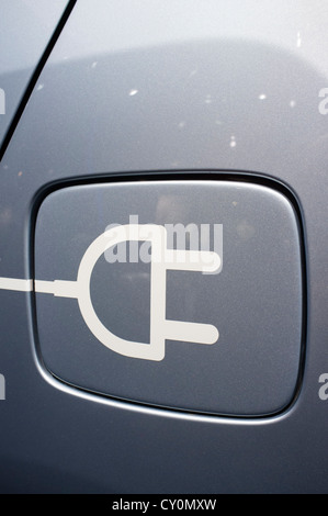 Detail of symbol on electric car for plug-in recharging at Paris Motor Show 2012 Stock Photo