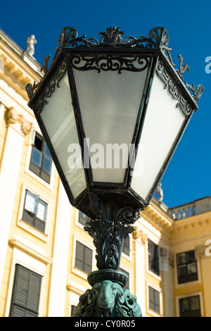 Old street lamp in front of Schoenbrunn Palace in Vienna, Austria Stock Photo