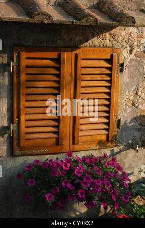 Shuttered windows in Italian village in Tuscany, Italy Stock Photo