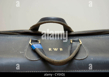 initials on suitcase