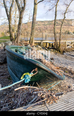 Green Abandoned Rowing Boat on the shore of Loch Tay Stock Photo