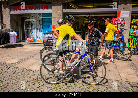 people with their bicycles in Fussen Germany during a touring vacation Stock Photo