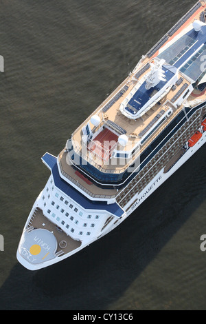Aerial photos of Celebrity Silhouette, a cruise ship owned by Celebrity Cruises, sailing into the port of Hamburg in Germany. Stock Photo