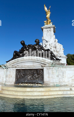 Bronze statue to Naval and Military Power on The Victoria Memorial in front of Buckingham Palace, The Mall, London, England, UK. Stock Photo