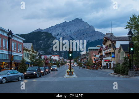 Banff Avenue in resort town of Banff in the Canadian Rocky Mountains located in the Banff National Park in Alberta, Canada. Stock Photo