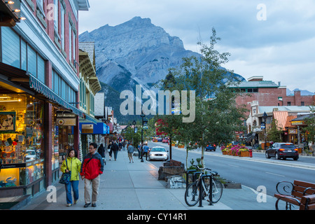 Banff Avenue in resort town of Banff in the Canadian Rocky Mountains located in the Banff National Park in Alberta, Canada. Stock Photo