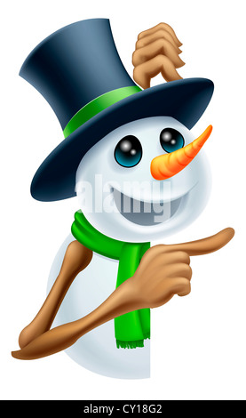 A snowman in a top hat and green scarf pointing at a Christmas message Stock Photo