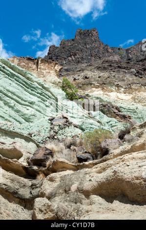 Coloured volcanic rocks at Fuente Los Azulejos, Gran Canaria, Canary Islands Spain, a popular tourist spot Stock Photo