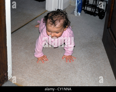 Eighteen Month Old Baby Girl Crawling Stock Photo