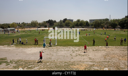 player playing world cup football field children k Stock Photo