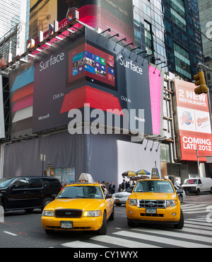 A billboard in Times Square in New York announces the arrival of the Microsoft entry into the tablet wars, the Surface RT Stock Photo