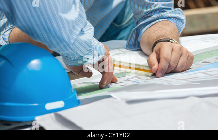 Discussing construction plans Stock Photo