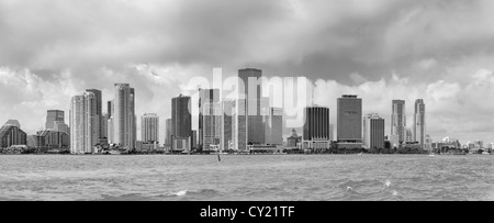 Miami skyline panorama in black and white in the day with urban skyscrapers and cloudy sky over sea Stock Photo