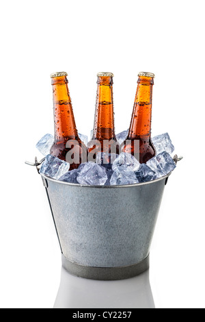 beer bottles in a bucket of ice isolated on white background Stock Photo