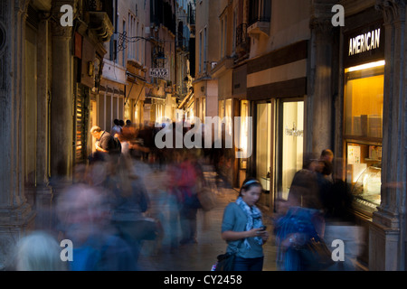 People shopping along a street near to St Mark's Square, Venice, Italy Stock Photo