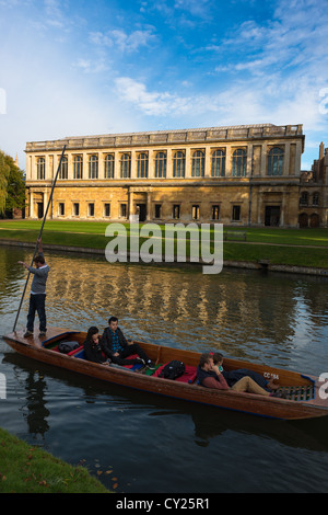 The Wren Library, Trinity College Cambridge, with punting in front on the river Cam, UK.